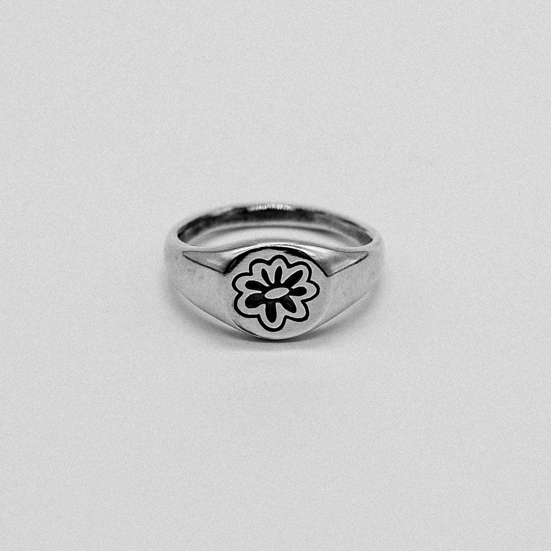 Handcrafted sterling silver flower signet ring handmade by BETWEEN3SEAS and Sophie Fletcher Designs 