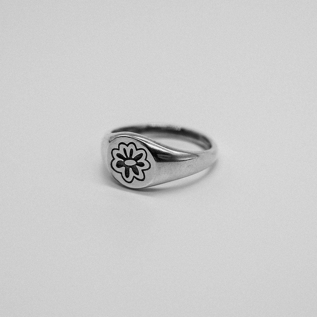 Handcrafted flower signet ring in sterling silver